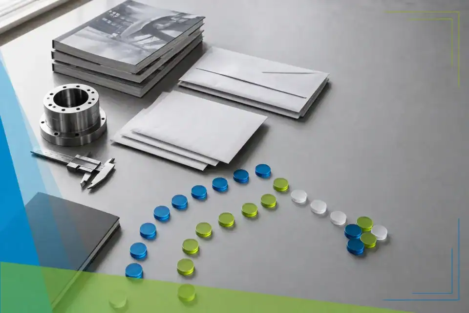 Editorial still life showing a manufacturing advertising strategy through trade magazines, blank mail pieces, industrial tools, and channel markers converging toward qualified leads.
